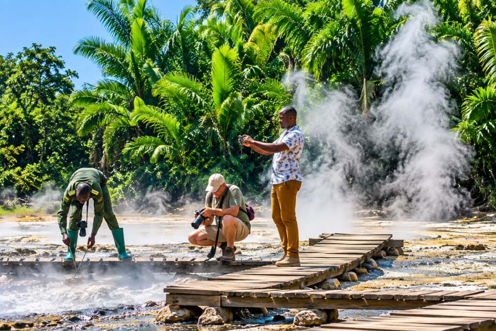 Visitors photographing Sempaya Hot Springs in Uganda